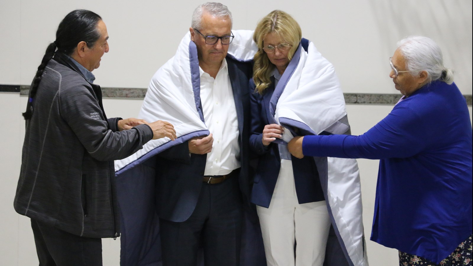 Keith and Cathy Martell presented with a star blanket honouring their generous gift